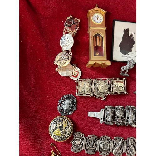 9 - A BASKET OF ECLECTIC MIX OF INTERESTING ITEMS BRASS CLOCK TWO SILHOUETTE FRAMED AND GLASSED