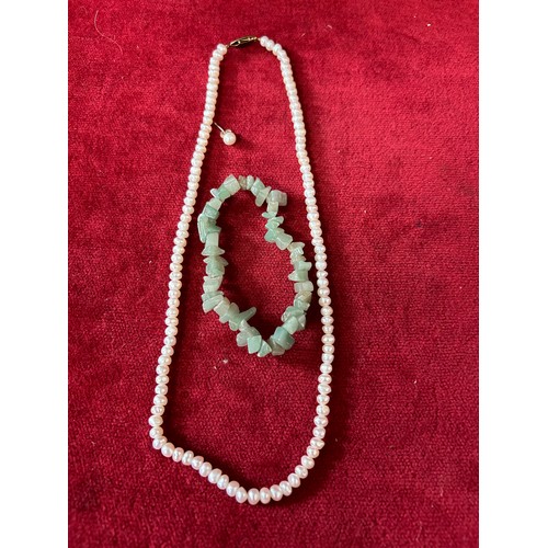 48 - A STRING OF REAL SOUTH SEA PEARLS REALLY NICE WITH BOX PLUS A JADE BRACELET