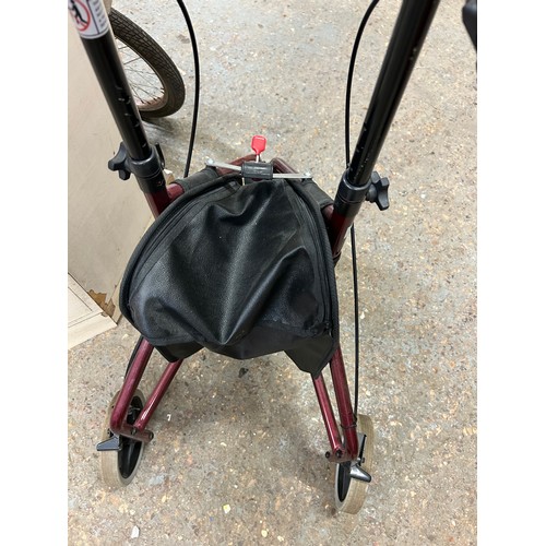 498 - A TRI FOLDING MOBILITY WALKER