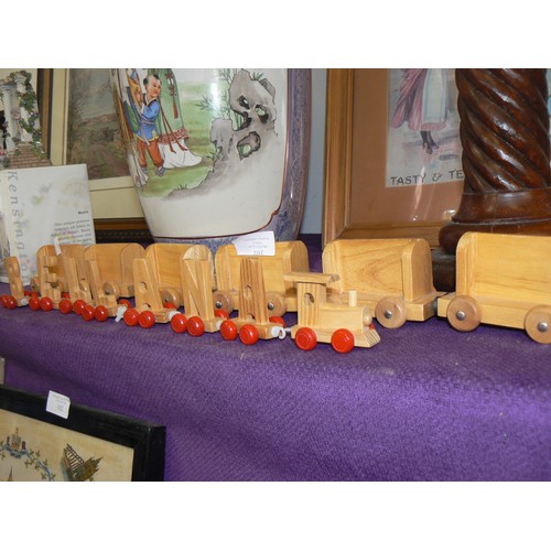 105 - 2 WOODEN TOY TRAINS