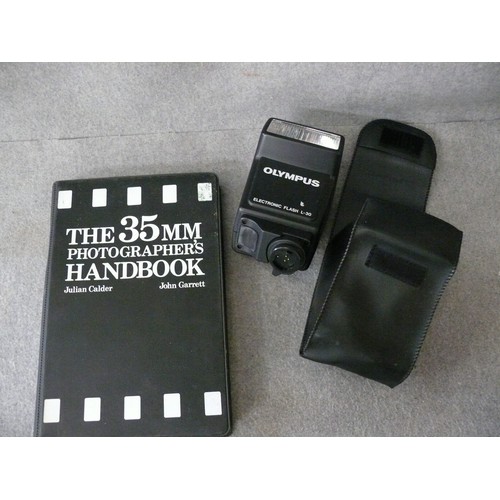 244 - OLYMPUS ELECTRONIC FLASH L-30. TOGETHER WITH OLYMPUS 35MM PHOTOGRAPHERS HANDBOOK.