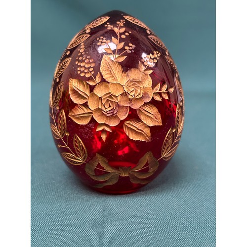 10 - Russian ruby glass egg in the style of Faberge engraved & gilded with flowers and leaves - 10cm h