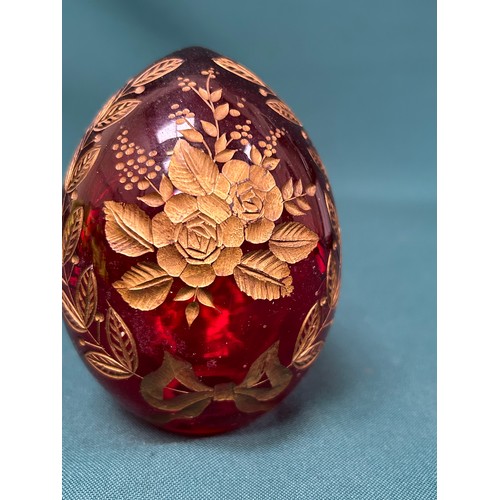 10 - Russian ruby glass egg in the style of Faberge engraved & gilded with flowers and leaves - 10cm h