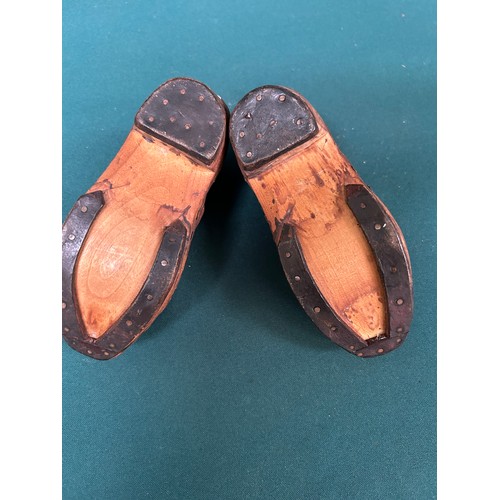 401 - Early 20th Century leather and wooden clogs for a small child - 14cm length