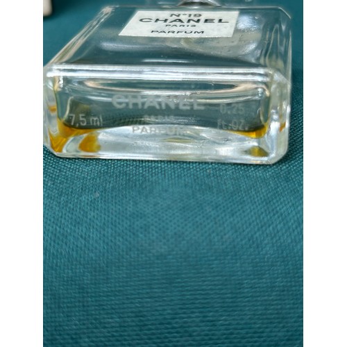 62 - A vintage Chanel No 19 glass scent bottle with stopper and original box - etched 