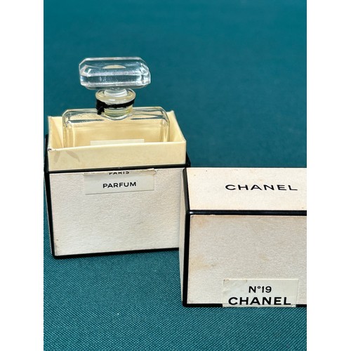 62 - A vintage Chanel No 19 glass scent bottle with stopper and original box - etched 