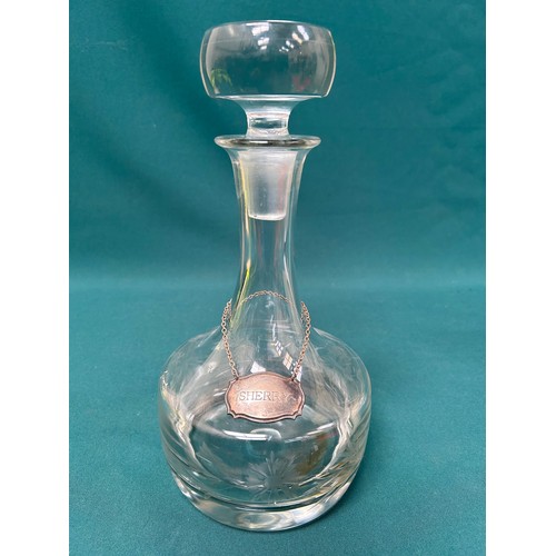 203 - Heavy glass decanter and stopper with silver plated Sherry label