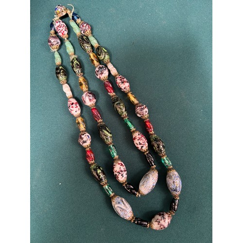 57 - Vintage Glass bead jewellery including a long Art Deco necklace with slender beads divided by gilt r... 