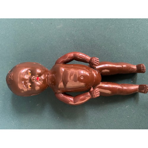 343 - A circa 1930's black doll with composition body & head and moving glass eyes, probably the original ... 