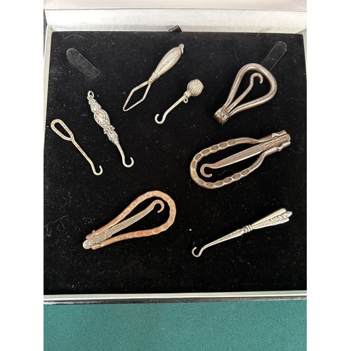 29 - Collection of 8 Victorian and Edwardian glove button hooks including 3 with silver handles, one with... 