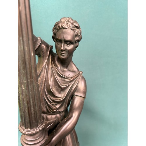 280 - Large metal figural candlestick or lamp base - in the form of a Grecian holding a torch. 57cm