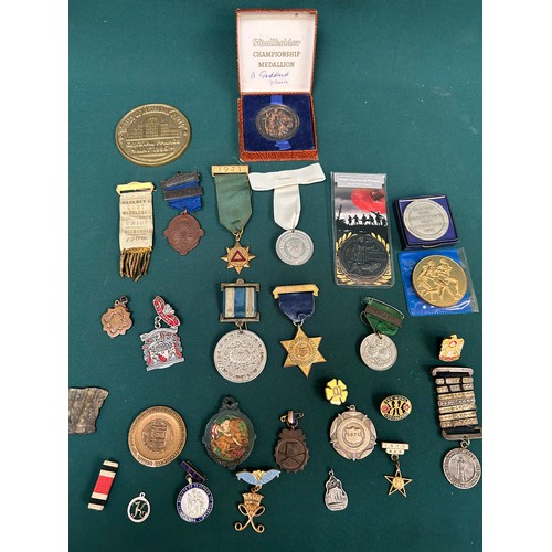 134 - Collection of various badges and medals to include School Board attendance medals, Band of help for ... 