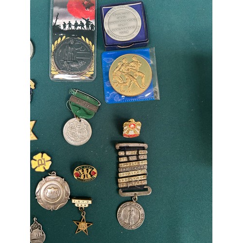 134 - Collection of various badges and medals to include School Board attendance medals, Band of help for ... 