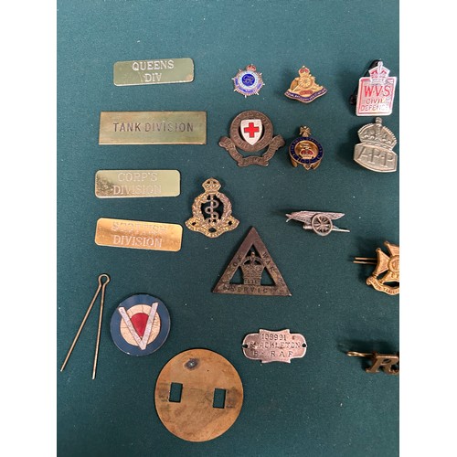 128 - Mostly Military badges including WW1 Munitions 