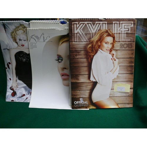 62 - LARGE COLLECTION OF OFFICIAL KYLIE CALENDARS