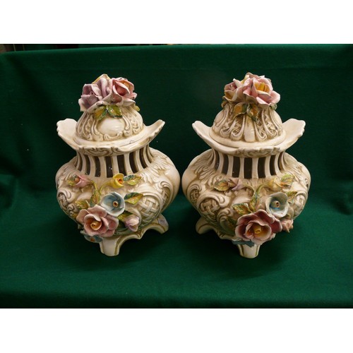 75 - A PAIR OF CAPODIMONTE PORCELAIN LIDDED VASE. DOES HAVE SMALL CHIPS TO THE LIDS BUT IN OVERALL GOOD C... 