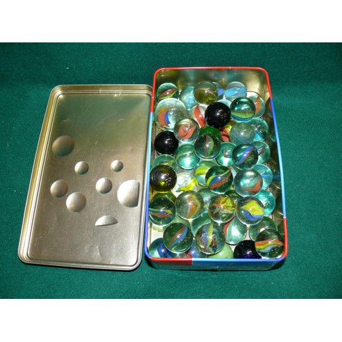 80 - A TIN OF 49 LARGE MARBLES