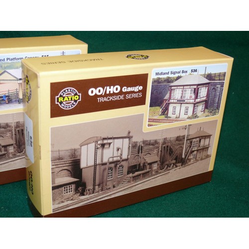 107 - A BOXED OO GAUGE MIDLAND SIGNAL BOX PLUS 2 ISLAND PLATFORM CANOPIES ALSO BOXED