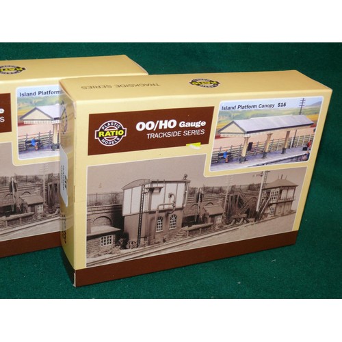 107 - A BOXED OO GAUGE MIDLAND SIGNAL BOX PLUS 2 ISLAND PLATFORM CANOPIES ALSO BOXED