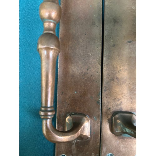 353 - Two good pairs of door handles from the first half of the 20th Century, one pair brass, the other br... 