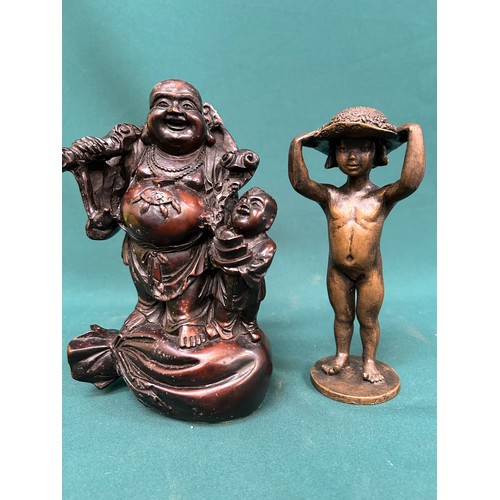 92A - LAUGHING BUDDHA FIGURE AND A BRONZE RESIN FIGURE OF A LITTLE GIRL WITH A BIG HAT - 20CM H