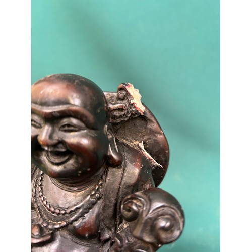 92A - LAUGHING BUDDHA FIGURE AND A BRONZE RESIN FIGURE OF A LITTLE GIRL WITH A BIG HAT - 20CM H