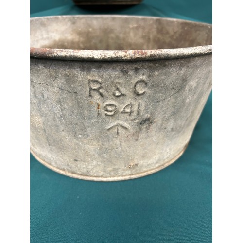 415 - Two ex military galvanised horse feeding bowls, WW2 or before, one dated 1941 with broad arrow mark ... 