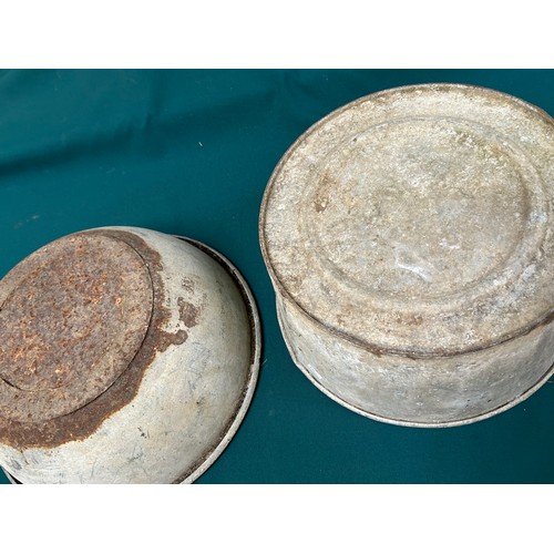 415 - Two ex military galvanised horse feeding bowls, WW2 or before, one dated 1941 with broad arrow mark ... 