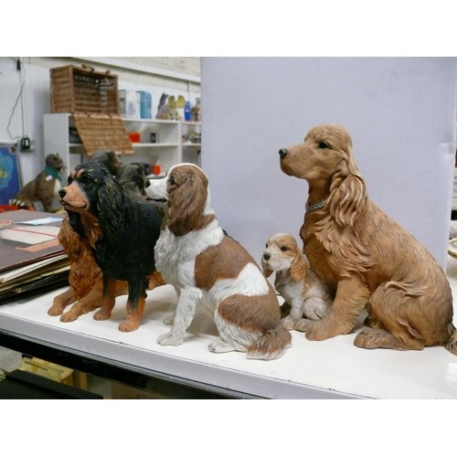 387 - 4 DOG FIGURINES TO INCLUDE COUNTRY ARTISTS AND DANBURY MINT