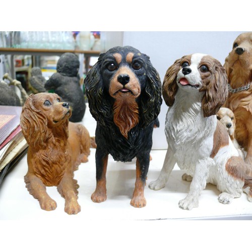 387 - 4 DOG FIGURINES TO INCLUDE COUNTRY ARTISTS AND DANBURY MINT