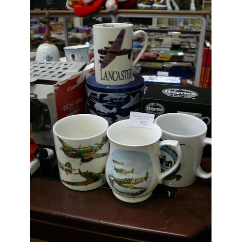 392 - COLLECTION OF AEROPLANE MUGS TO INCLUDE A NEW HAYNES SPITFIRE COLOUR CHANGING MUG AND A RAF LANCASTE... 