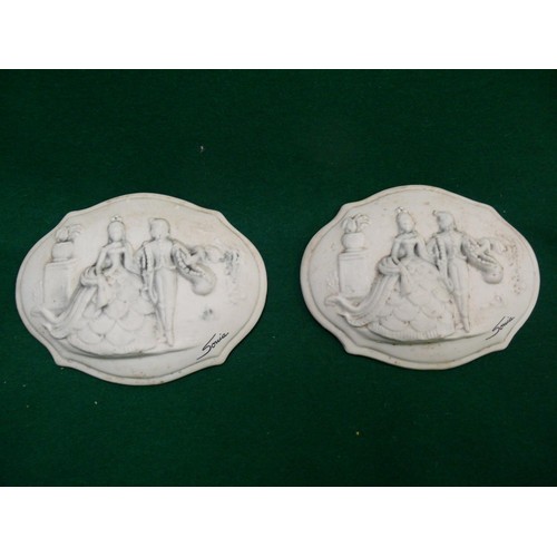 390 - A PAIR OF BISQUE PORCELAIN CAPODIMONTE PLAQUES