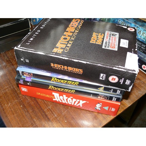 442 - DVD BOX SETS OF HITCHIKERS GUIDE TO THE GALAXY AND ASTERIX PLUS 2 DVDS OF THE ROCKETEER