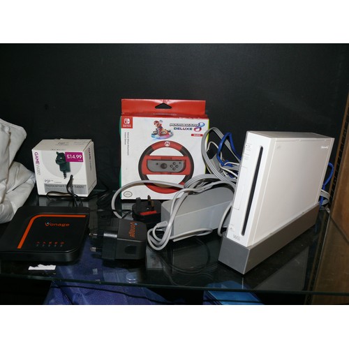 482 - A WII CONSOLE AND VARIOUS ACCESSORIES PLUS GAMES INCLUING MARIO BROS, MONOPOLY, G-FORCE ETC