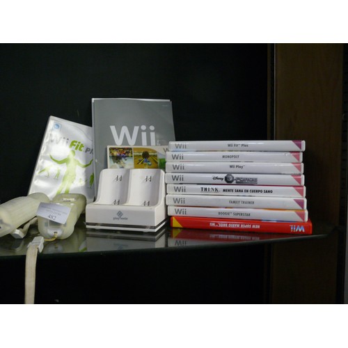 482 - A WII CONSOLE AND VARIOUS ACCESSORIES PLUS GAMES INCLUING MARIO BROS, MONOPOLY, G-FORCE ETC