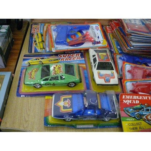 501 - LARGE COLLECTION OF NEW AND PACKAGED TOYS CARS, GUNS ETC