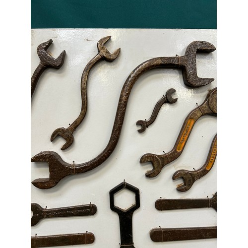 375 - Display with good collection of spanners, wrenches, adjustable wrenches etc. Includes a very large c... 