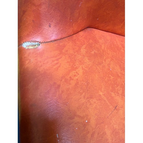 491 - Set of four 1970's stacking chairs upholstered in original burnt orange vinyl fabric - one has paint... 