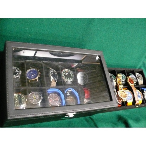 35 - A WATCH DISPLAY BOX WITH 23 NEW OR NEARLY NEW WATCHES A LOT OF WHICH ARE WORKING FINE, REFER TO PHOT... 