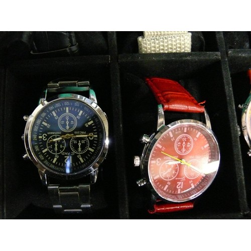 35 - A WATCH DISPLAY BOX WITH 23 NEW OR NEARLY NEW WATCHES A LOT OF WHICH ARE WORKING FINE, REFER TO PHOT... 