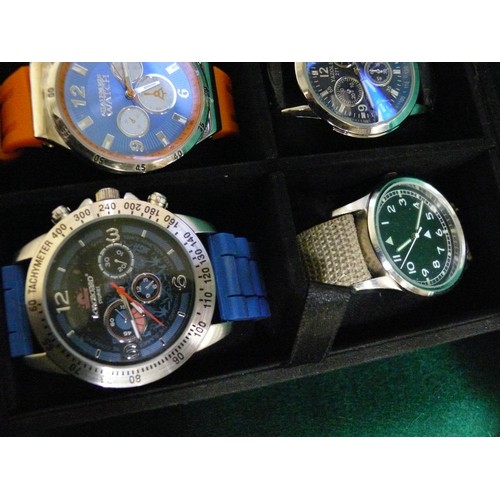 35 - A WATCH DISPLAY BOX WITH 23 NEW OR NEARLY NEW WATCHES A LOT OF WHICH ARE WORKING FINE, REFER TO PHOT... 