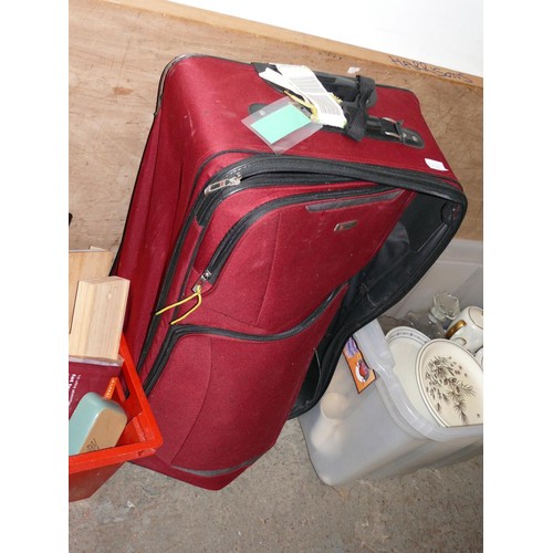 579 - LARGE RED TROLLEY SUITCASE