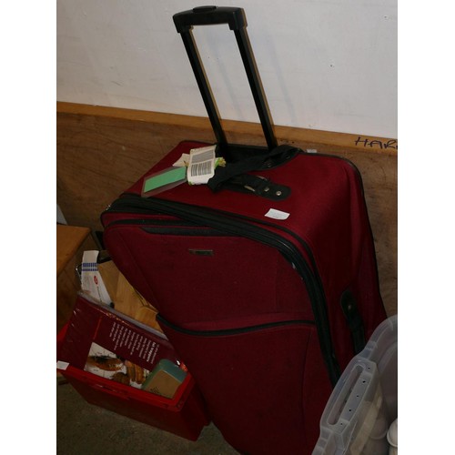 579 - LARGE RED TROLLEY SUITCASE