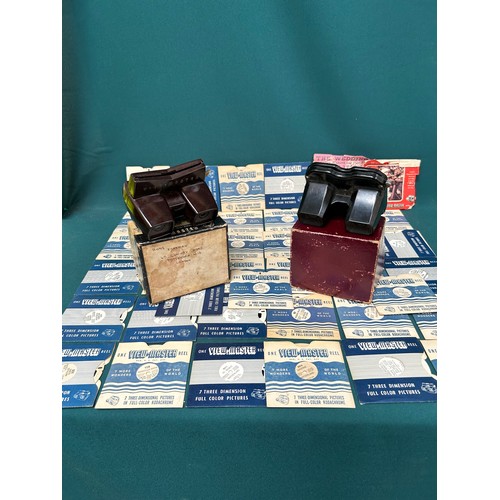 338 - Two Viewmaster 3 dimensional viewers with a large quantity of picture reel slides including Queen El... 