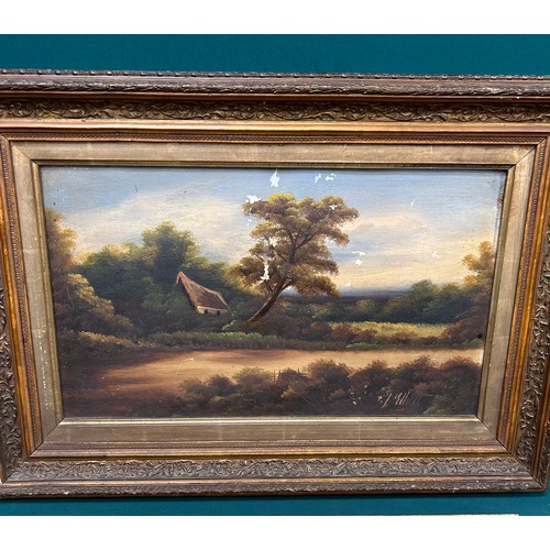 160 - A 19th Century Oil Painting on canvas of a river scene with a figure on a bridge. Inscribed in penci... 