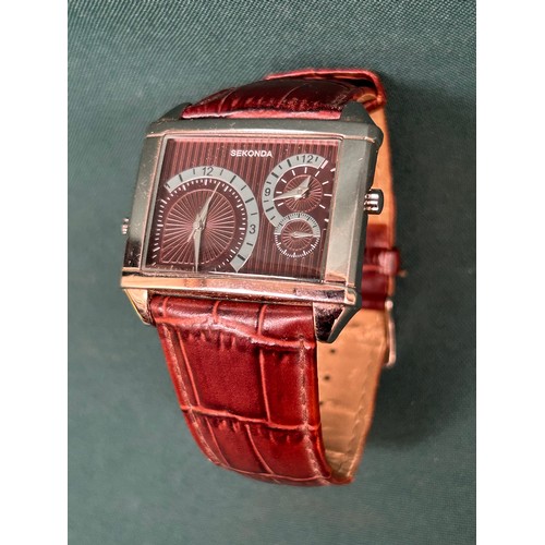 69 - A rare Sekonda dual time wrist watch on genuine leather strap