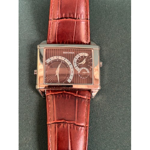 69 - A rare Sekonda dual time wrist watch on genuine leather strap