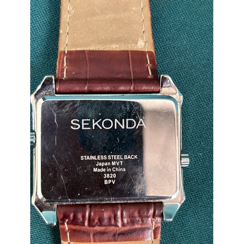 69 - A rare Sekonda dual time wrist watch on genuine leather strap