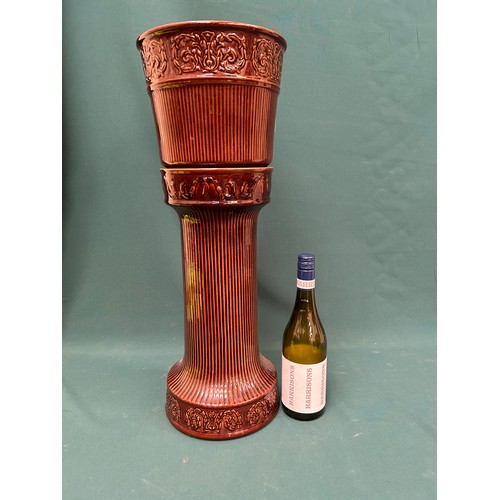 479 - A Mid Century West German Jardiniere on a stand in chocolate colour - reeded design with scroll bord... 