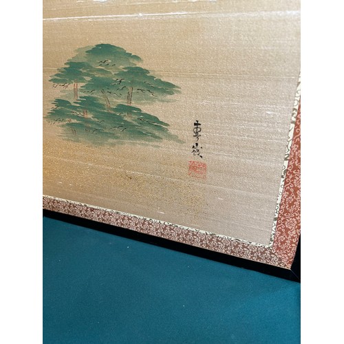 255 - Decorative oriental four panel table screen handpainted with a mountain landscape